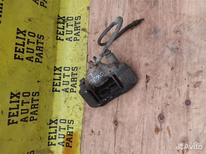 Суппорт передний левый Mazda Demio (dw3w) 1996-20