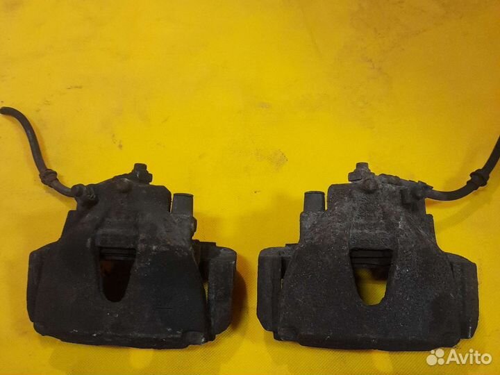 Суппорт Opel Astra H / Zafira B левый - правый