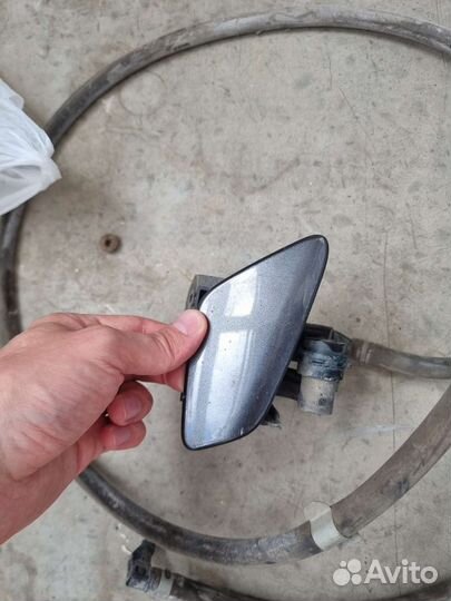 Форсунка левая омывателя фар + шланг