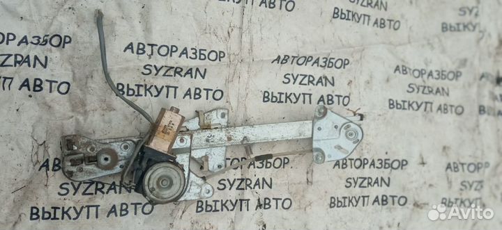 Стеклоподъемник Mazda Capella левый задний