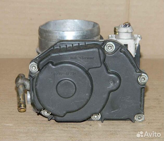 Заслонка дроссельная WV Golf 4 06A133064H