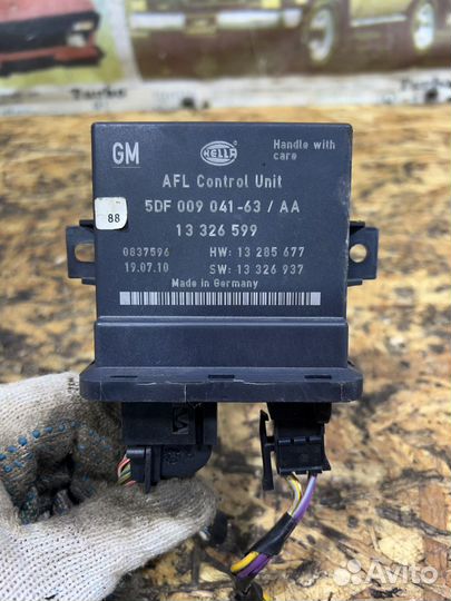 Блок управления светом Опель Астра J