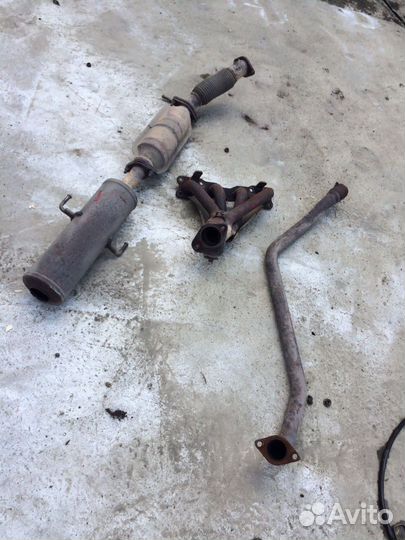 Kia cerato 2 koup коллектор выпускной