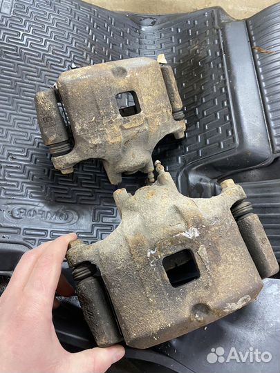 Суппорта передние лансер 10