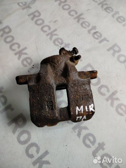 Суппорт тормозной передний левый Mitsubishi Mirage
