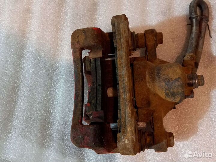 Суппорт задний левый Kia Ceed