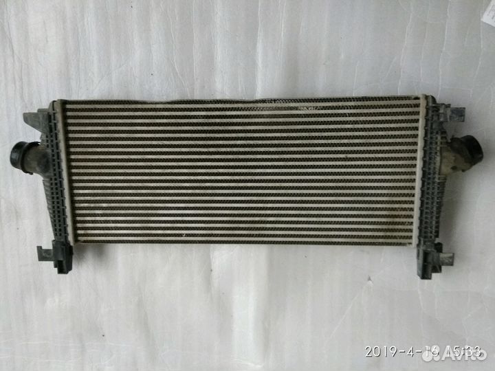 Opel Astra J радиатор интеркуллер