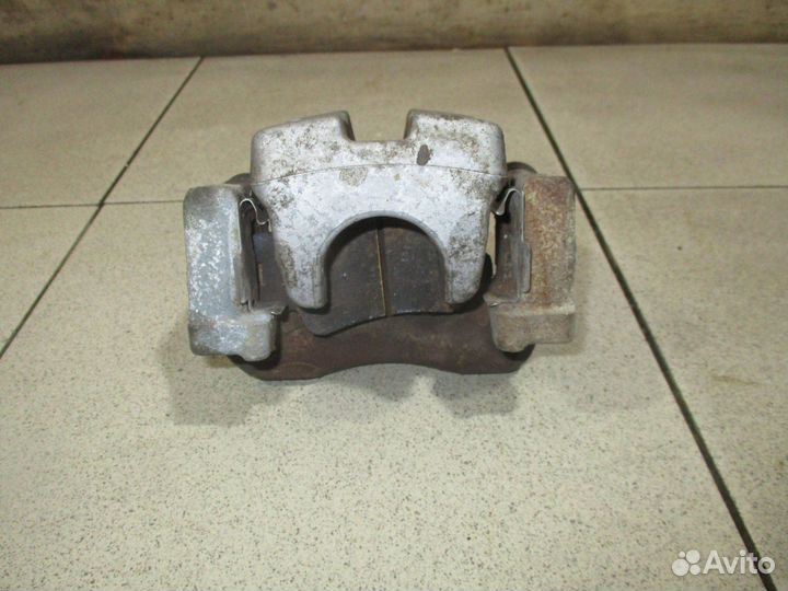 Суппорт задний левый Toyota Camry 50