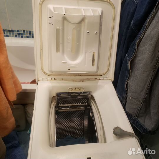 Стиральная машина автомат с вертикальной загрузкой