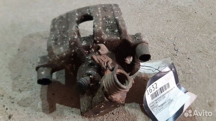 Суппорт тормозной задний левый задний левый Ford