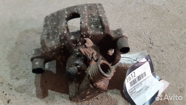 Суппорт тормозной задний левый задний левый Ford