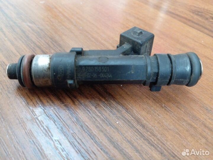 Форсунка инжекторная Opel Corsa C 2004