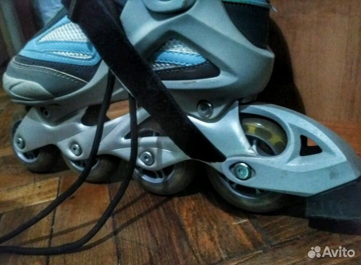 Роликовые коньки