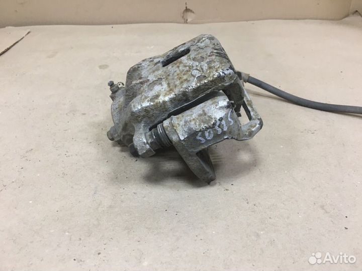 Суппорт тормозной передний правый Kia Magentis MG