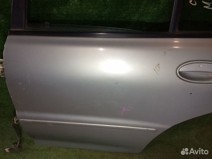 Дверь задняя левая Mitsubishi Lancer CB CD Серебро