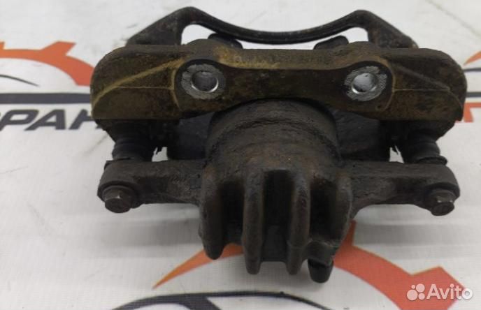 Суппорт тормозной передний левый Peugeot 308