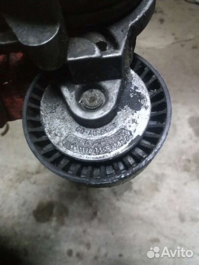 Натяжной ролик Бмв E65