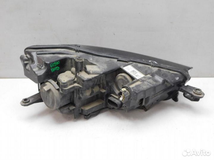 Фара левая Skoda Rapid