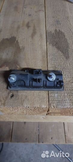 Задняя ручка(кнопка) багажника Фольксваген Джета 6