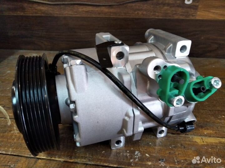 Компрессор кондиционера kia