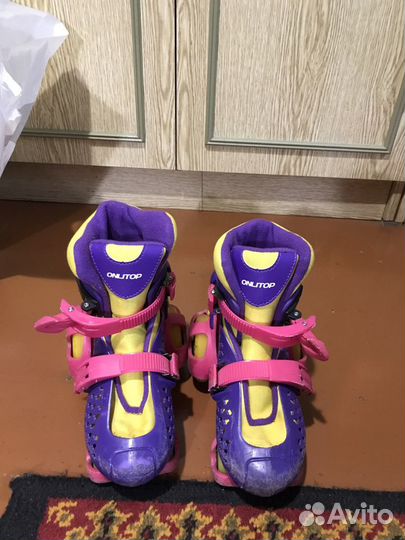 Роликовые коньки