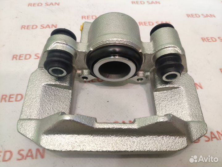 Суппорт тормозной задний правый Mitsubishi Pajero