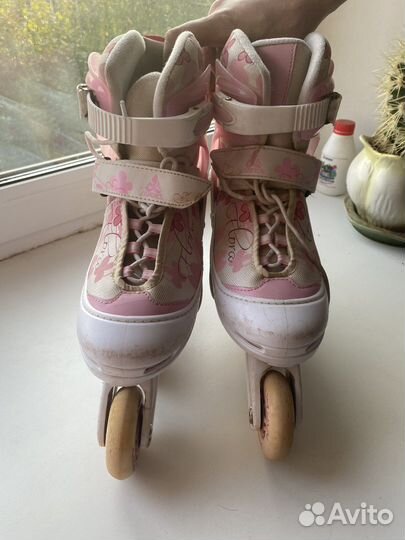 Роликовые коньки