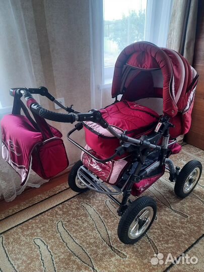 Всесезонная коляска-трансформер с люлькой