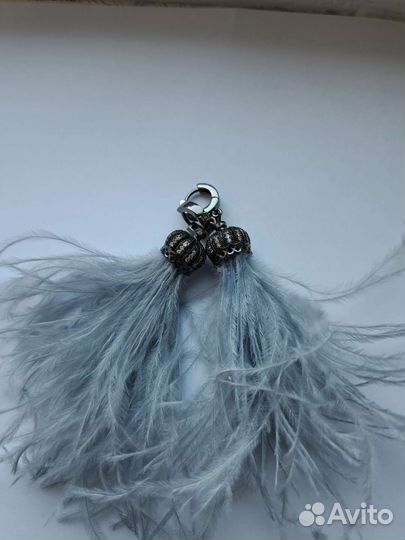 Серьги с перьями