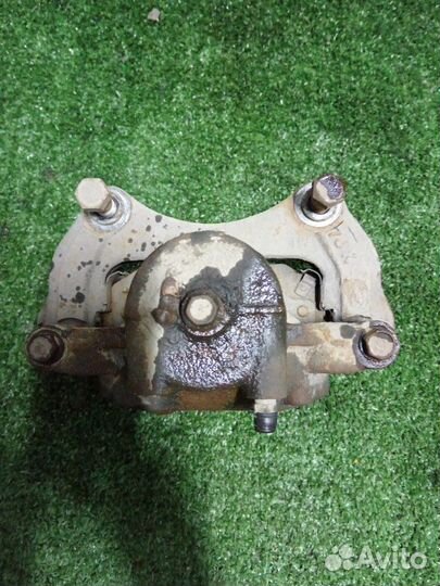 Суппорт тормозной передний левый Kia Optima JF