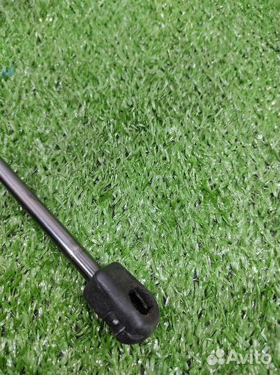 Амортизатор багажника правый Mitsubishi Lancer 10