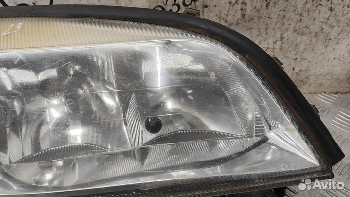 Фара передняя для Opel Zafira B 13252473