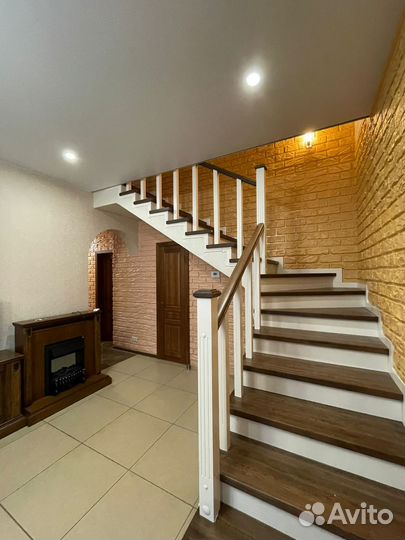 Облицовка бетонного каркаса лестницы деревом