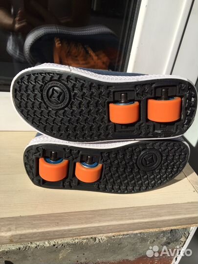 Кроссовки на роликах heelys