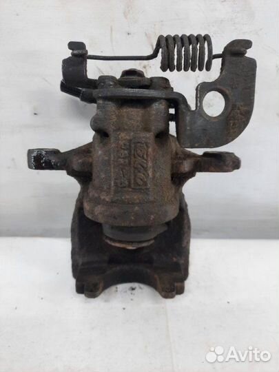 Суппорт тормозной задний левый Jaguar X-Type седан