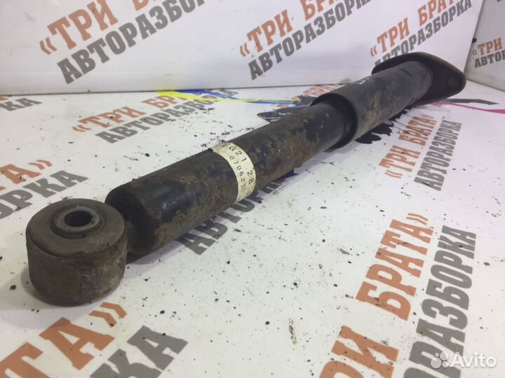 Мазда сх-7 Амортизатор задний правый