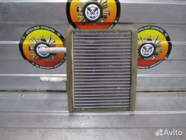 Радиатор отопителя печки Nissan Wingroad Y11 99-05