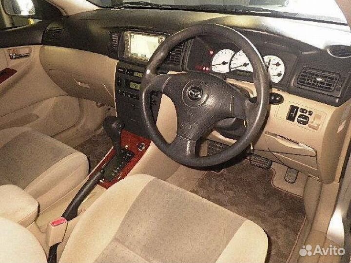 Обшивка багажника задняя Toyota Corolla runx NZE121