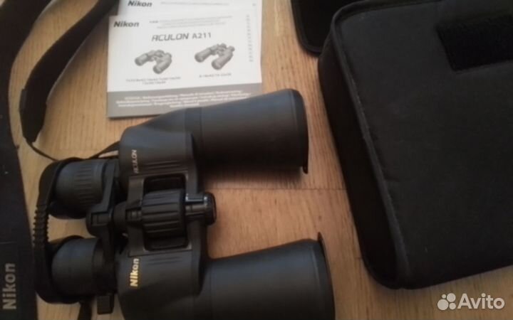 Бинокль Nikon aculon A211 10-22x50