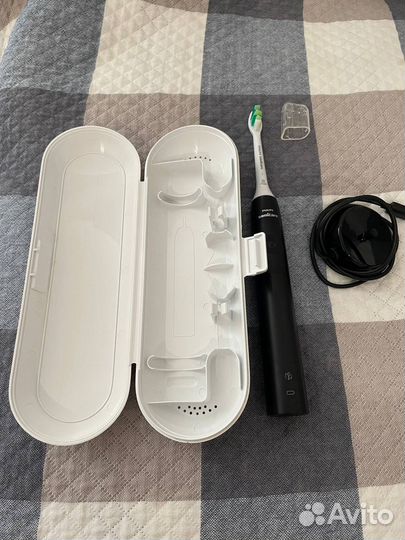 Электрическая зубная щетка Philips