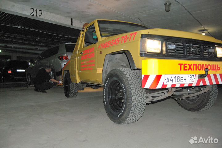 Эвакуатор из паркинга. Эвакуация машин