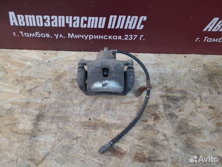 Суппорт тормозной передний левый Kia Ceed JD