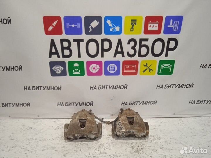 Суппорт тормозной передний Opel Astra H