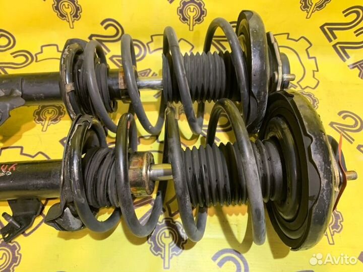 Стойки комплект передние Nissan Primera TP12