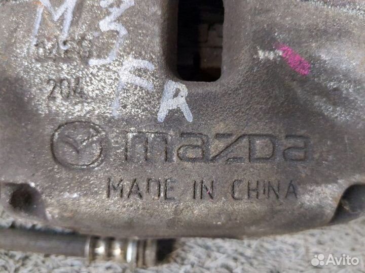 Суппорт тормозной передний правый Mazda 3 BM