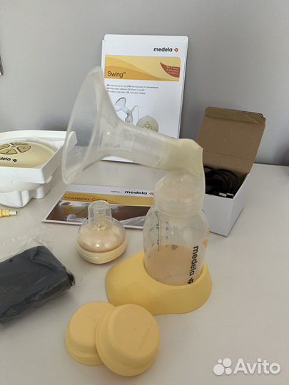 Молокоотсос medela swing электрический