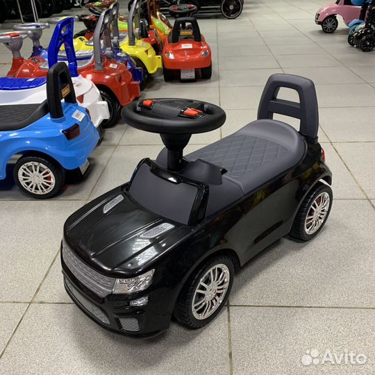 Каталка-автомобиль со звуковым сигналом
