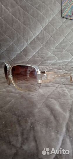Солнцезащитные очки женские брендовые