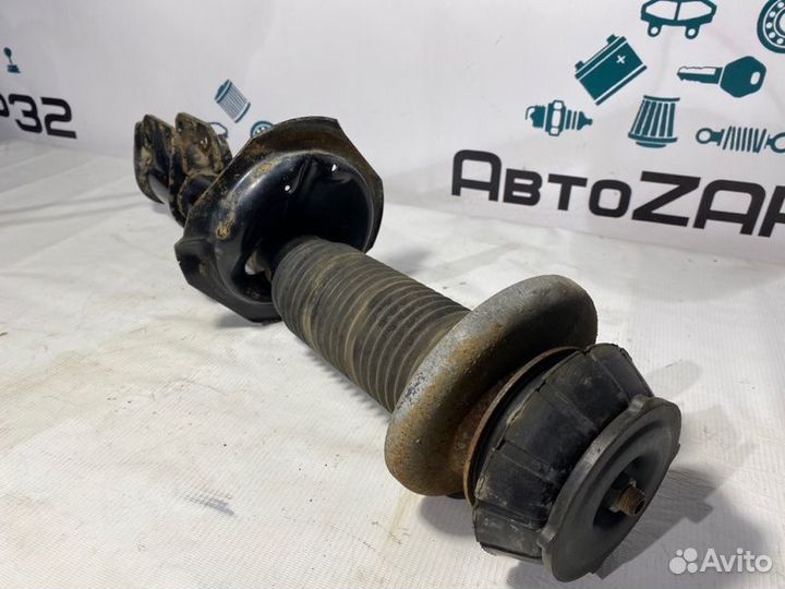 Амортизатор передний левый Suzuki Sx4 седан M16A