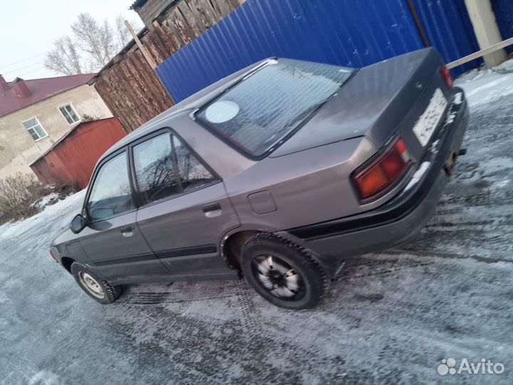 Mazda familia разбор